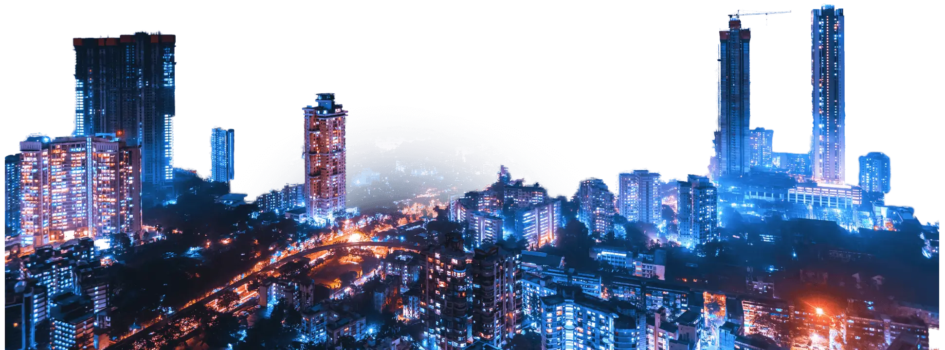 Panoramic view of a city skyline at night with high-rise buildings and streets illuminated in blue and orange lights, under a clear sky.